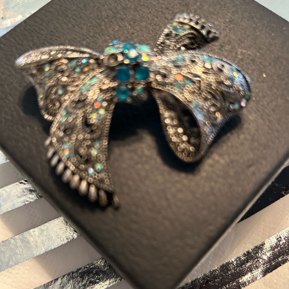 Intricate Silver and Blue Bow Brooch